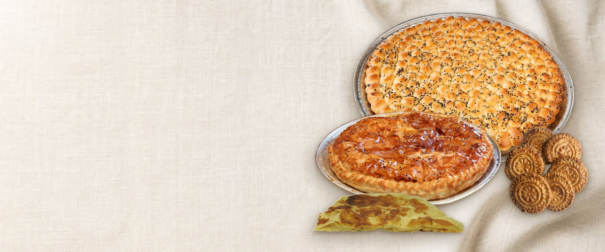 Golden Sabaya products arranged on linen