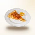Golden Sabaya sabaya slice with honey on a plate