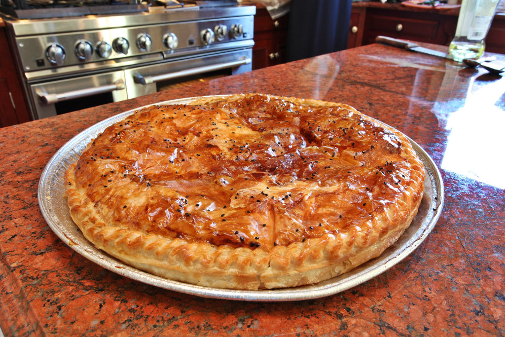 Whole baked Golden Sabaya sabaya on a round tray