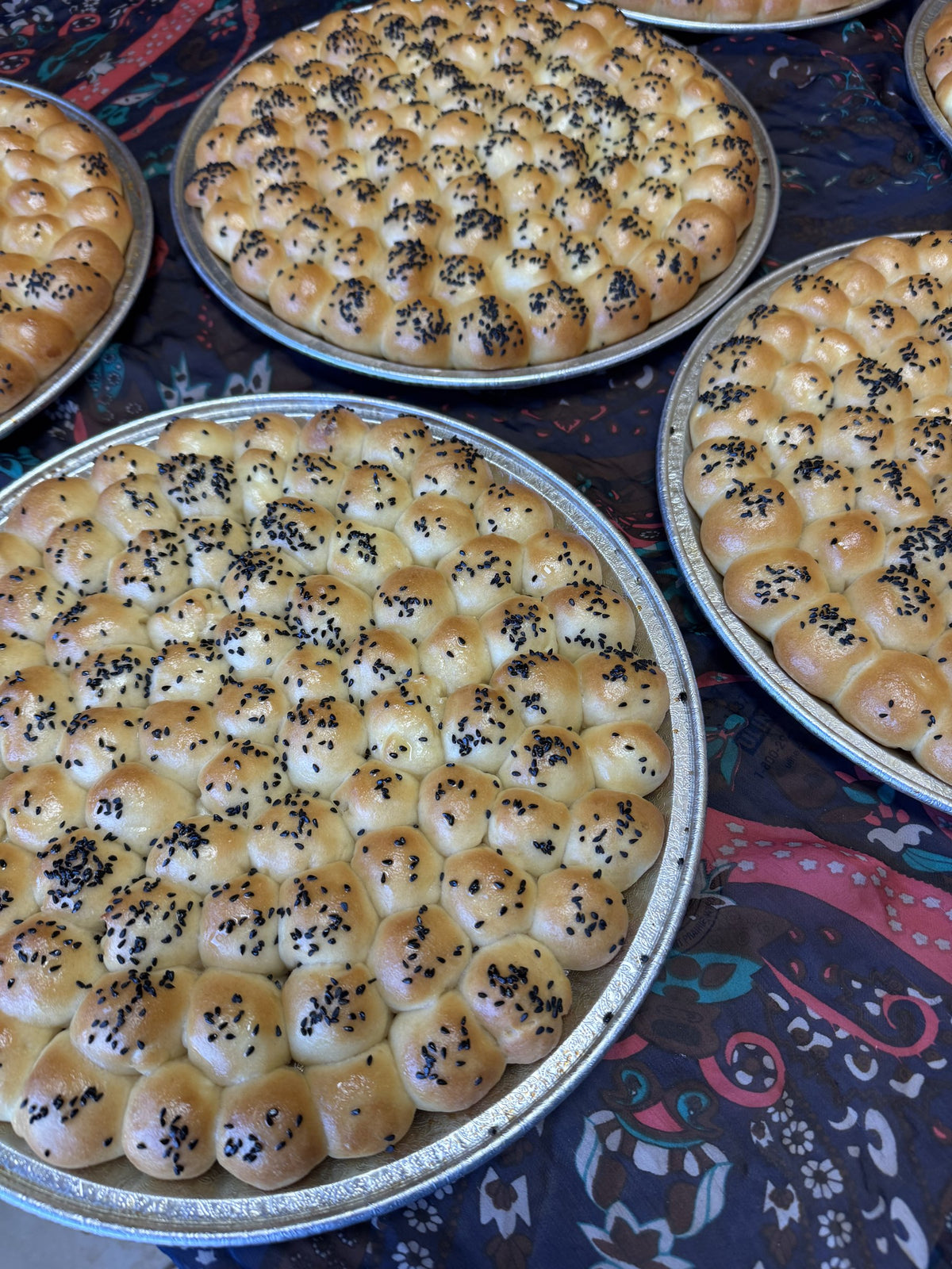 Trays of Golden Sabaya baked goods on display